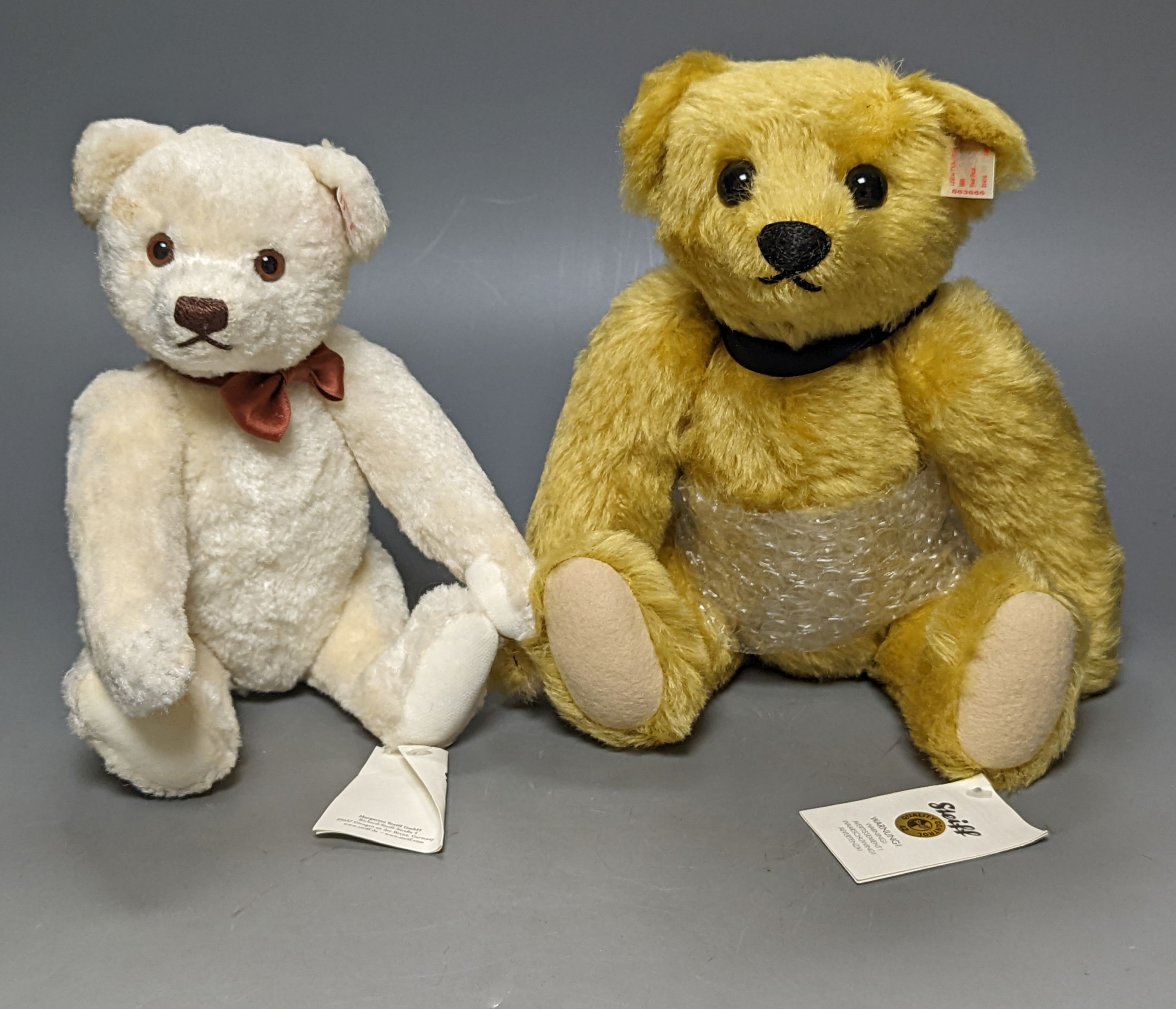 A Danbury Mint Steiff 'Bertie' with certificate and box, with a Steiff 'Bear of the Year 2010' with certificate and box, steiff bear 25 cms high.